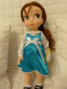 Belle. Her first baby doll. My favorite Disney princess, and close to her name as well!